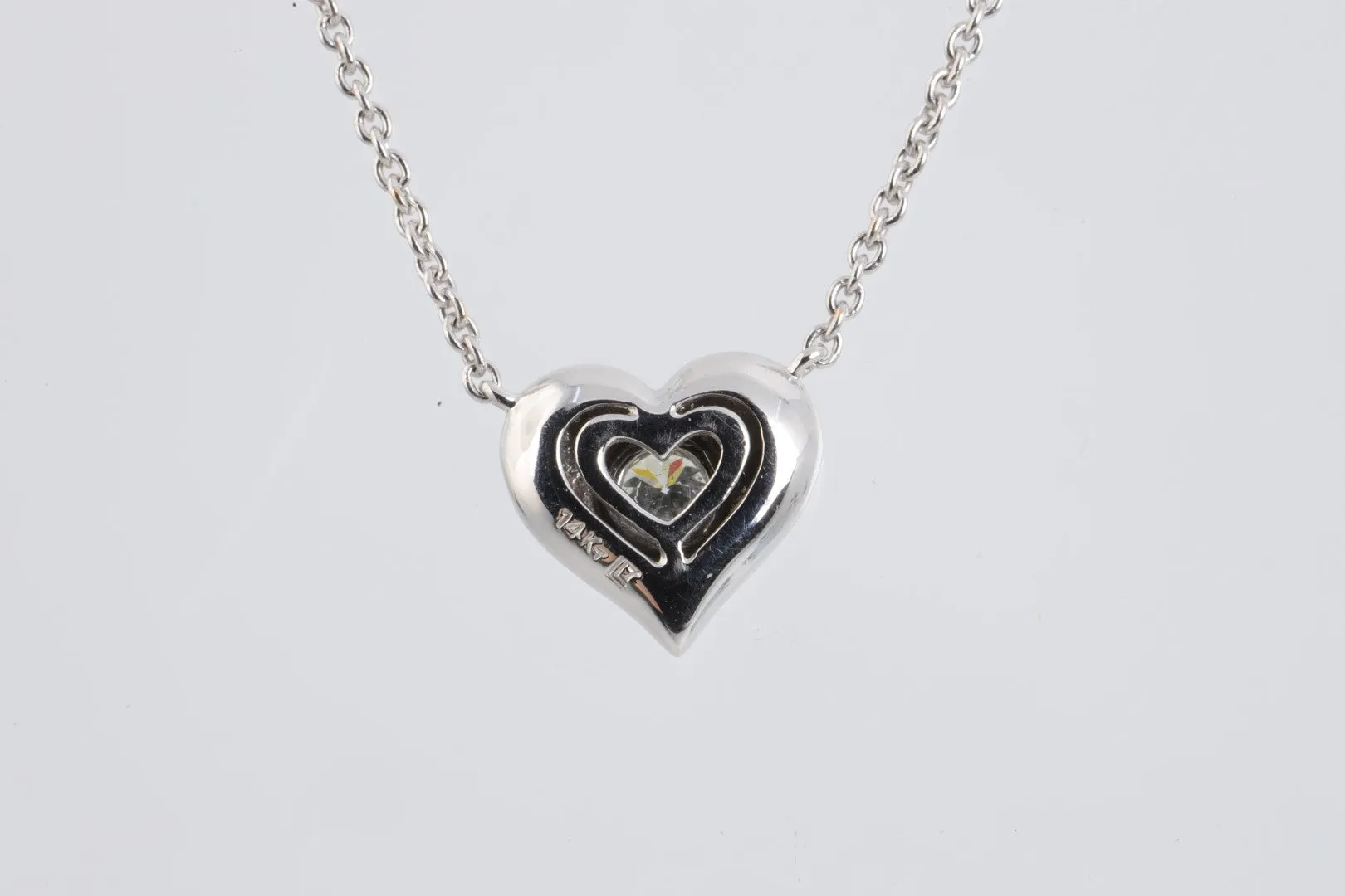 18" 14k White Gold 0.15tcw Diamond Heart Pendant Necklace (3.65g.)