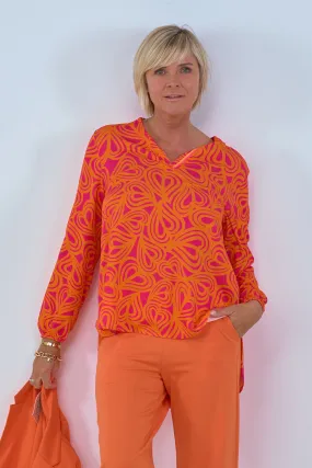 Bluse mit Phantasy-Muster, orange-pink